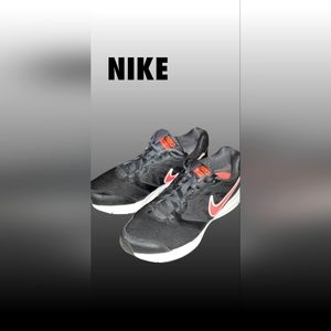 Pink and black Nike shoes